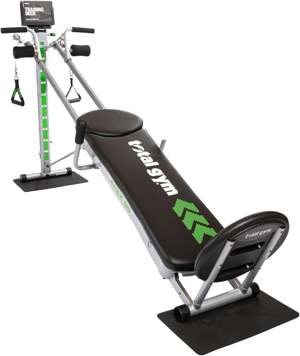 Total Gym Apex in black with green accents on a white background