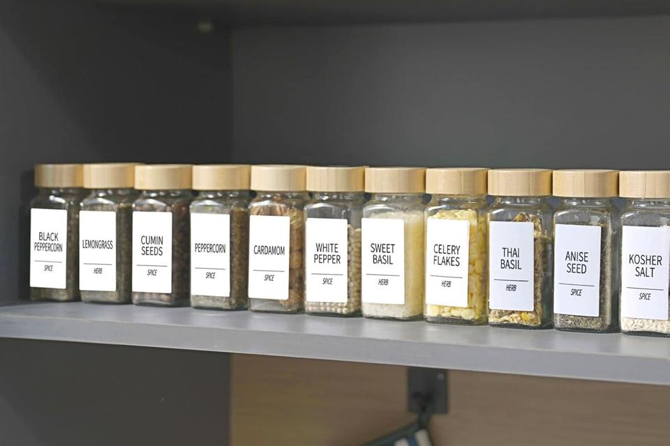 Churboro Spice Jars lined up on a shelf with spice labels