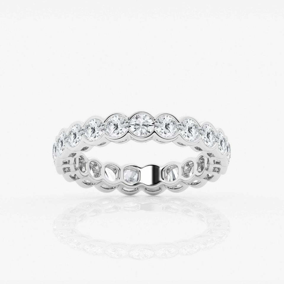 Ritani Half Bezel Round Lab Diamond Eternity Band against a white background