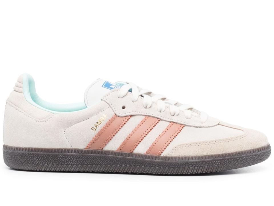 One Adidas Samba OG Sneaker with light blue and dusty pink accents.