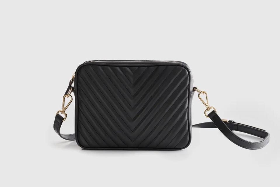 Quince Italian Leather Quilted Crossbody Bag in black on off-white background