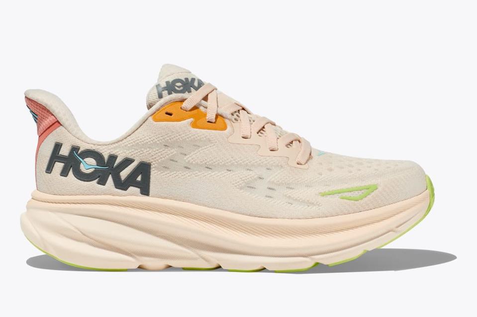 Hoka Clifton 9 running shoe in tan with light orange accents