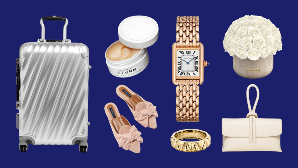 An assortment of luxury items against navy blue background