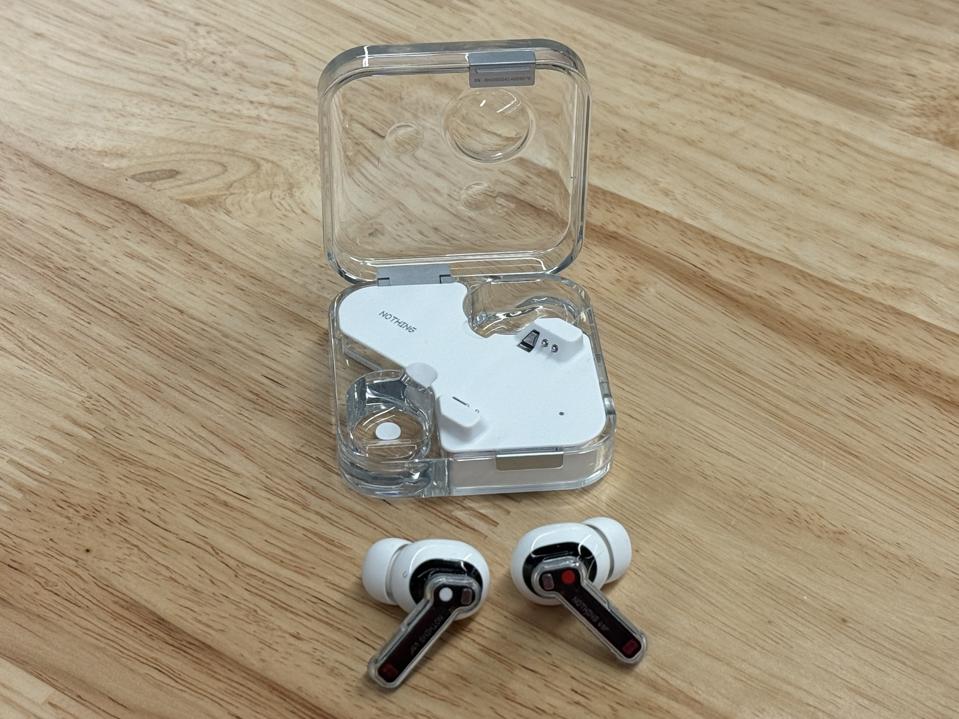 A pair of earbuds on a table