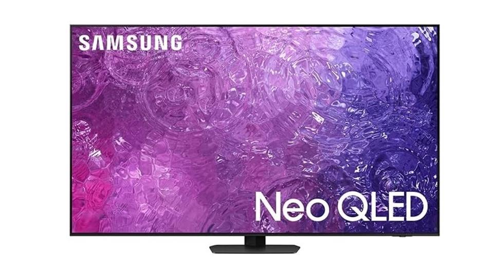 A Samsung QN90C Neo QLED 4K TV displaying an abstract purple background.