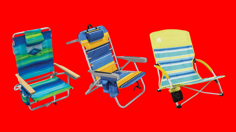 Three brightly colored and striped beach chairs on a bright red background