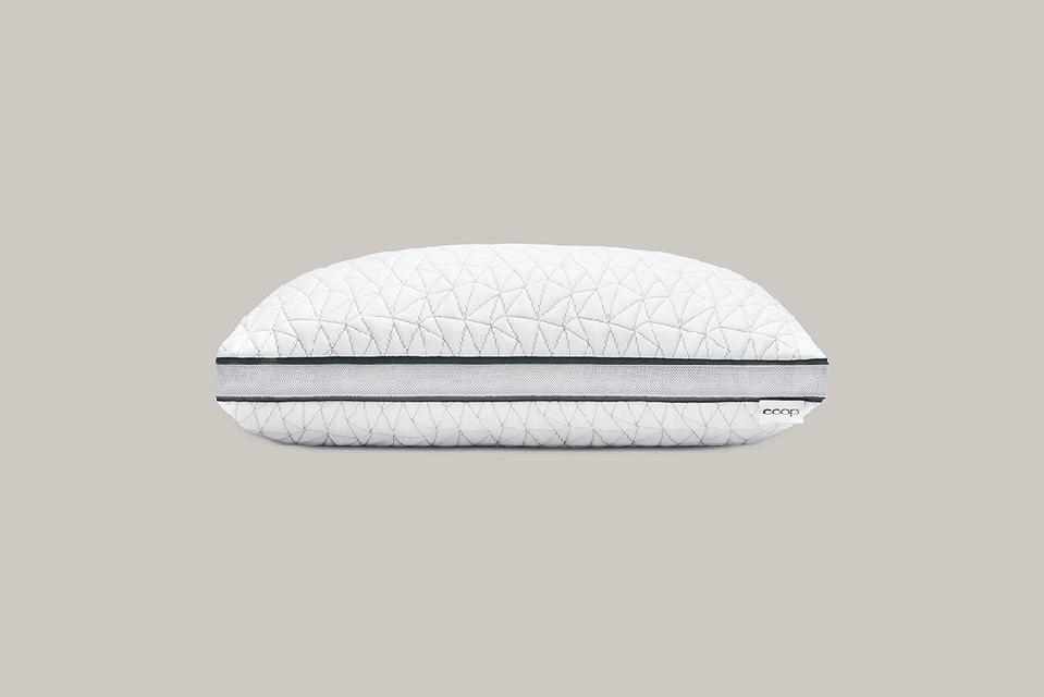 The Eden pillow from Coop Sleep Goods on a gray background. 