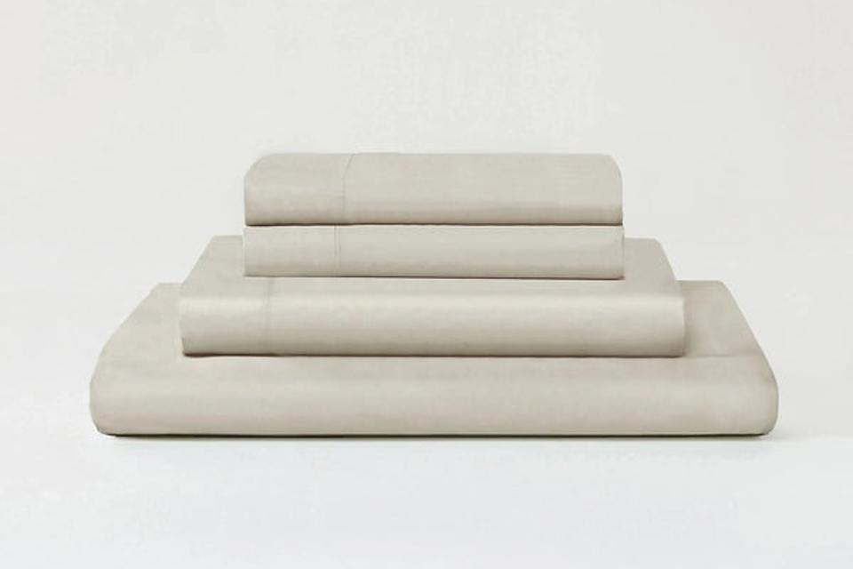 Sijo Airyweight Eucalyptus Sheet Set folded and stacked on a pale background.