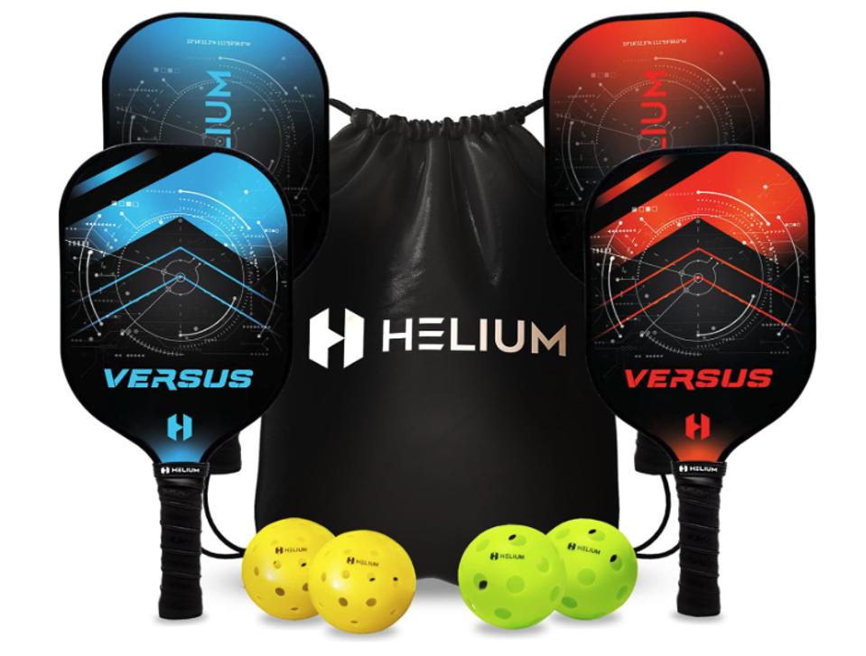 Helium Pickleball Paddle Set with four paddles and 4 balls against a white background.