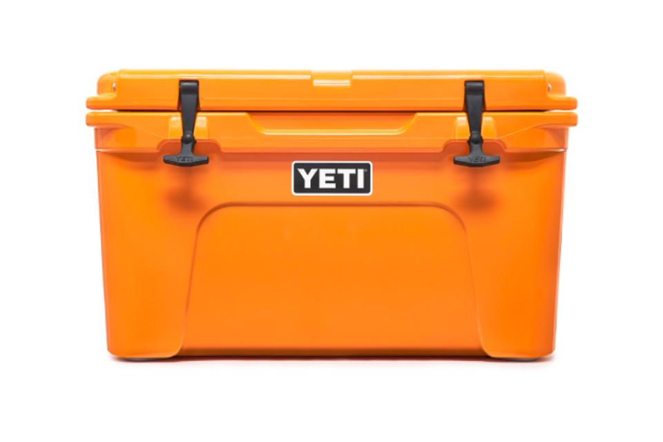 Product shot of a Yeti Tundra 45 Cooler in the King Crab Orange colorway. 