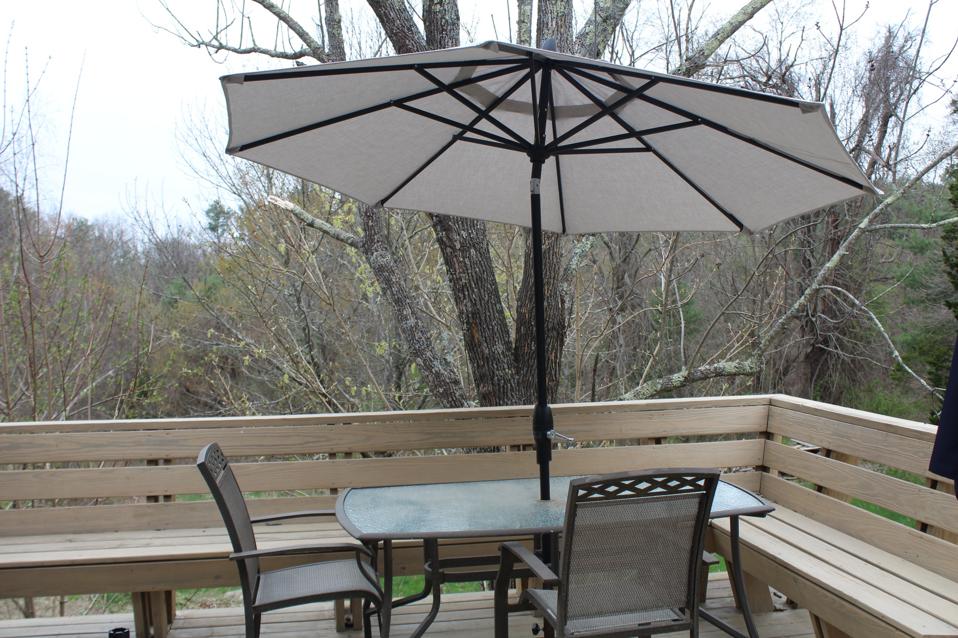 Treasure Garden patio umbrella on table