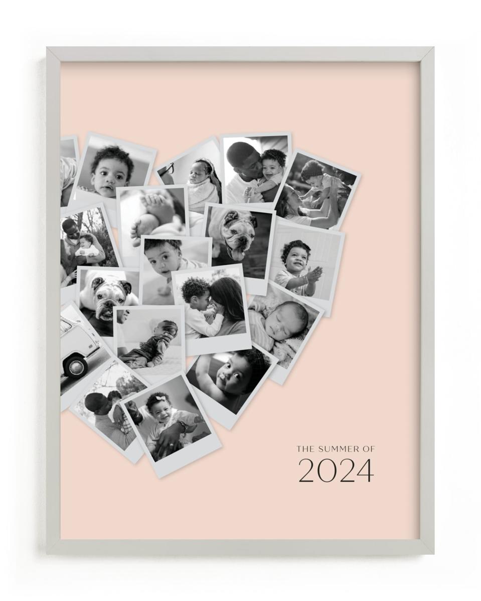 A light wood picture frame with a collage of black and white images arranged in a heart shape.