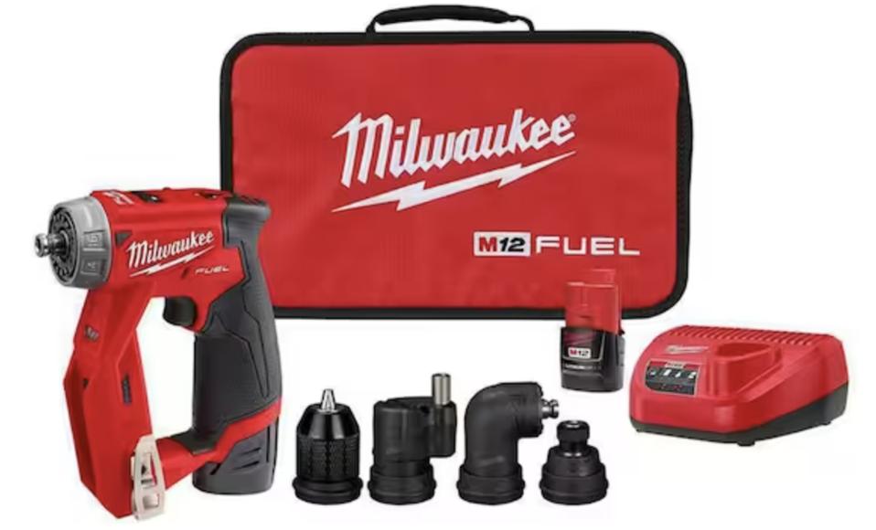 Milwaukee M12 drill with 4 tool heads, charger and red carrying case