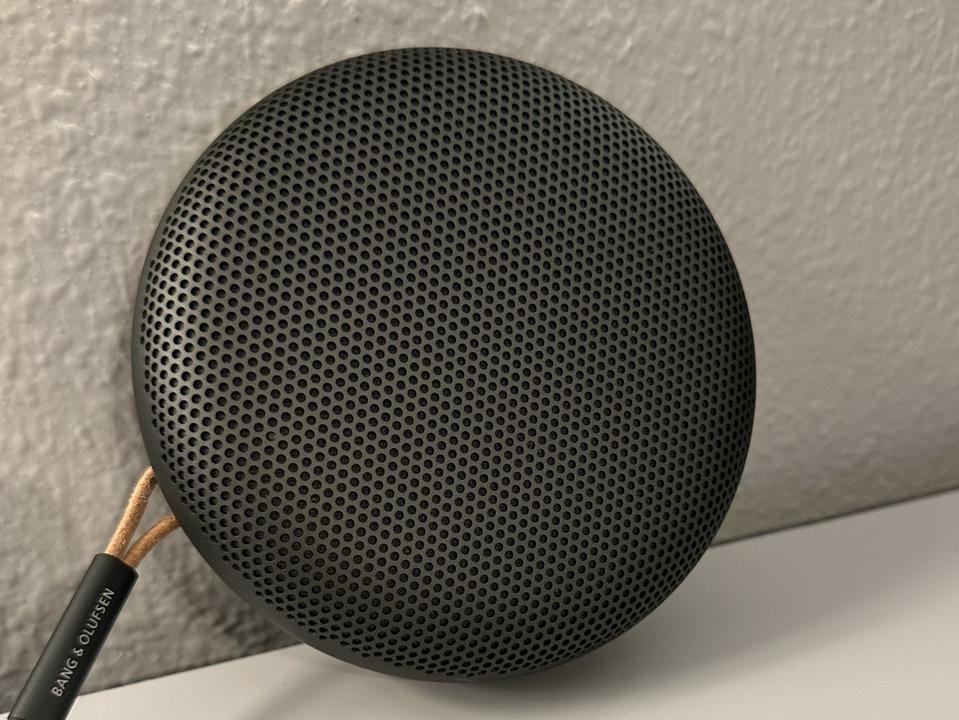 Bang & Olufsen Beosound A1 (2nd Gen) leaning against a wall.