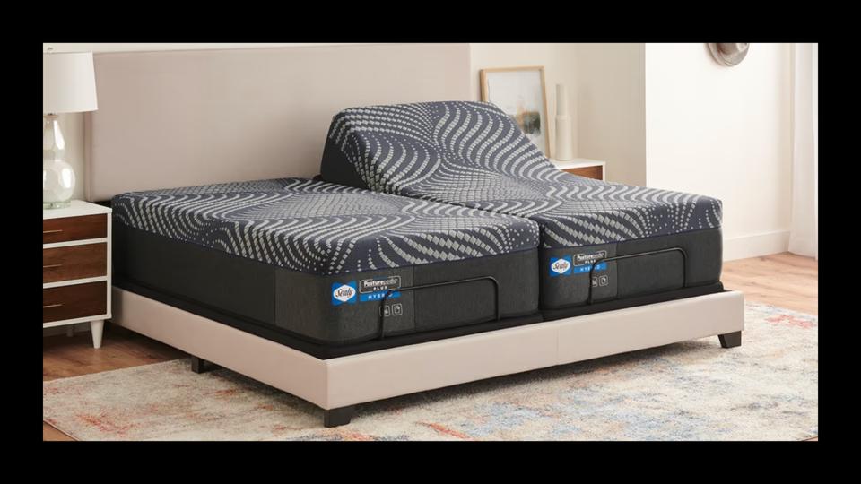 The Sealy Adjustable Bed Frame with beds on top of it. 