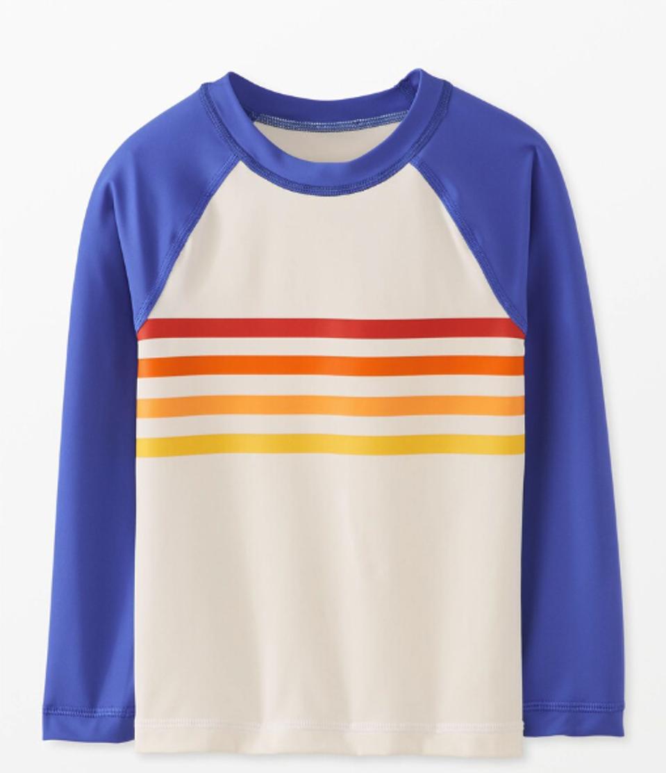 A striped kid's rash guard shirt