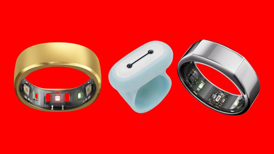 three sleep tracker rings on a red background