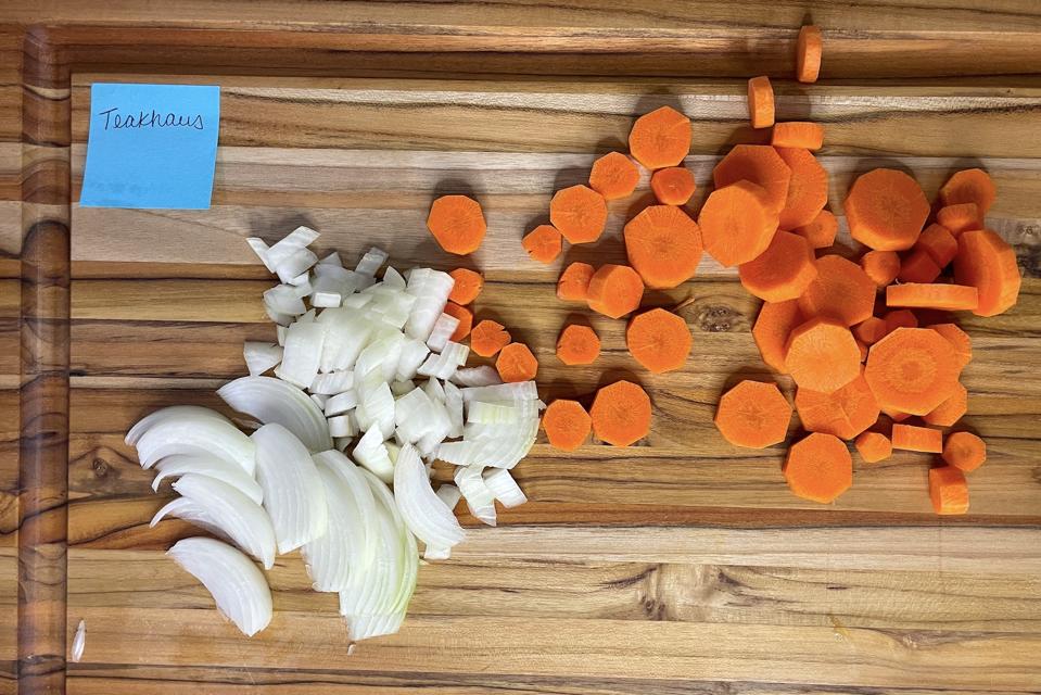 Teakhaus cutting board with carrots and onions