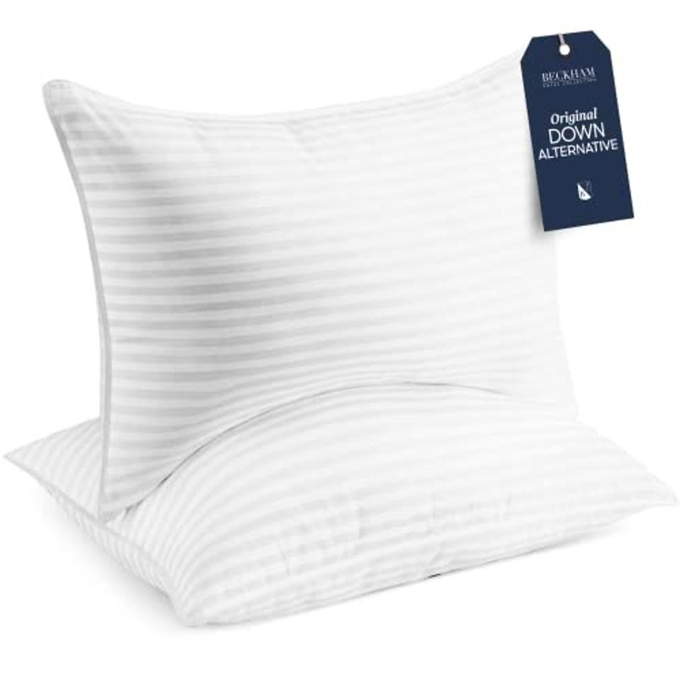 Product shot of two Beckham Hotel Collection Bed Pillows on a white background.