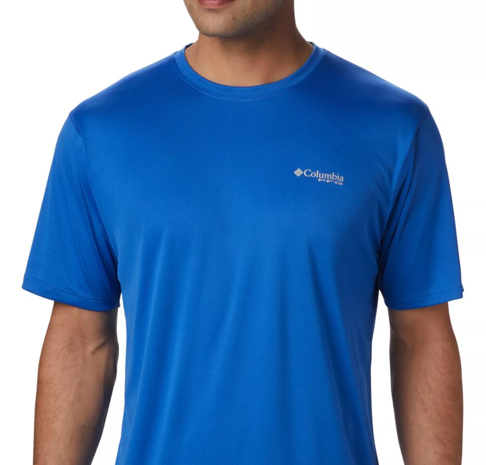 A man wearing a blue t-shirt