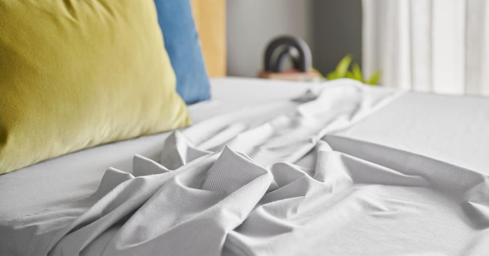 The Tempur-Pedic ProAir Sheet Set in White on a bed