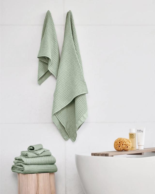 Onsen Waffle Bath Towel Set in a white bathroom.