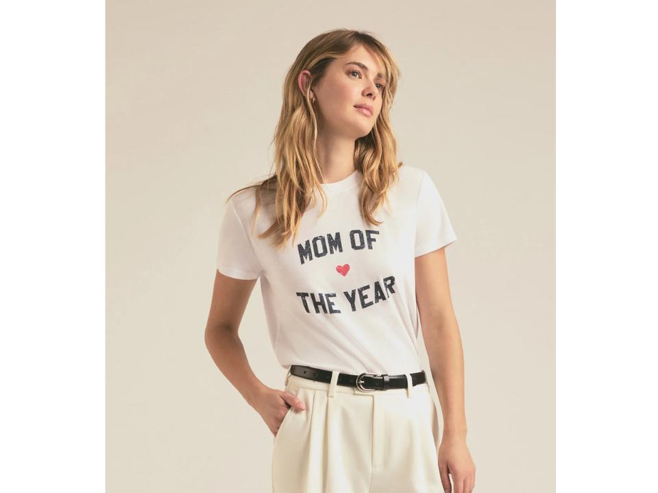 photo of blonde woman wearing Favorite Daughter Mom Of The Year collegiate Tee