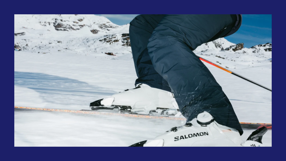 A picture of someone skiing in a pair of Salomon boots