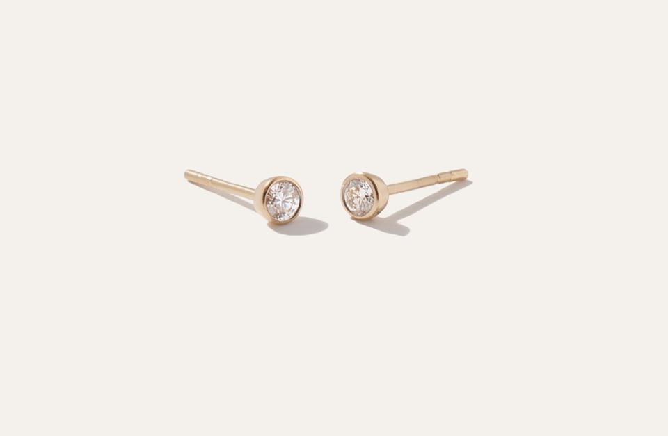 Product shot of Quince 14K Gold Round Diamond Petite Bezel Studs