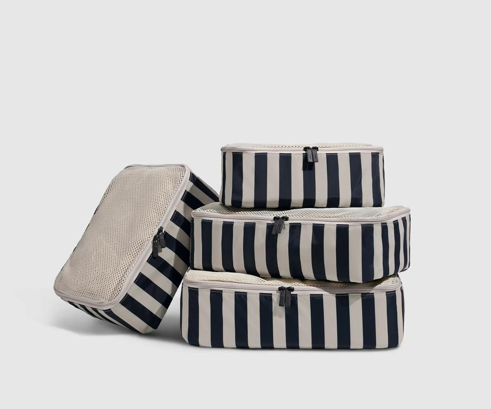 Black and white striped packing cubes.