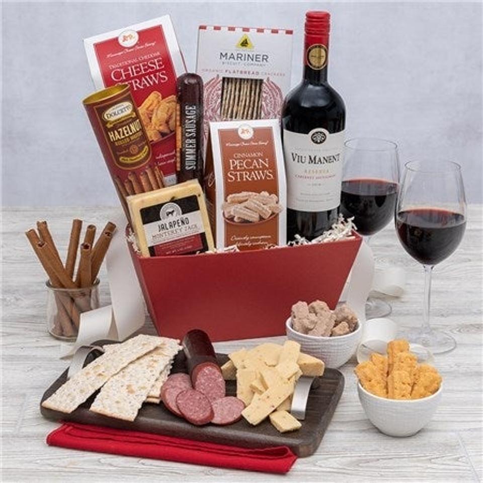 gourmet gift baskets Classic Red Wine Gift Basket w/ cheese & snacks on marble-y surface