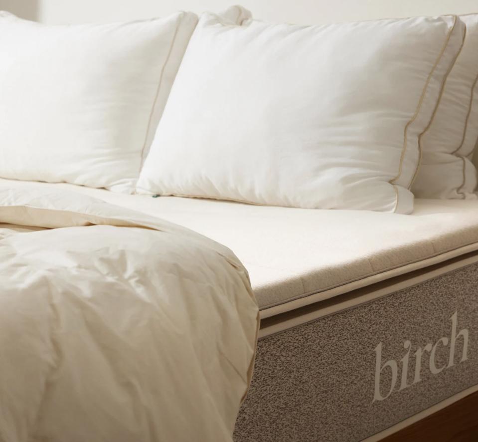 Birch Plush Organic Mattress Topper on a Birch mattress with pillows