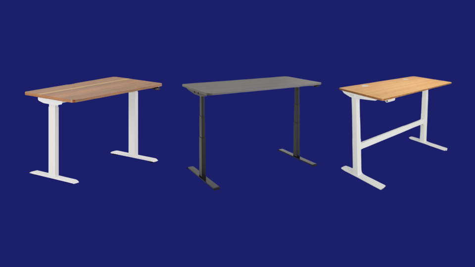 Two brown and 1 black standing desks, including the Branch Duo desk.