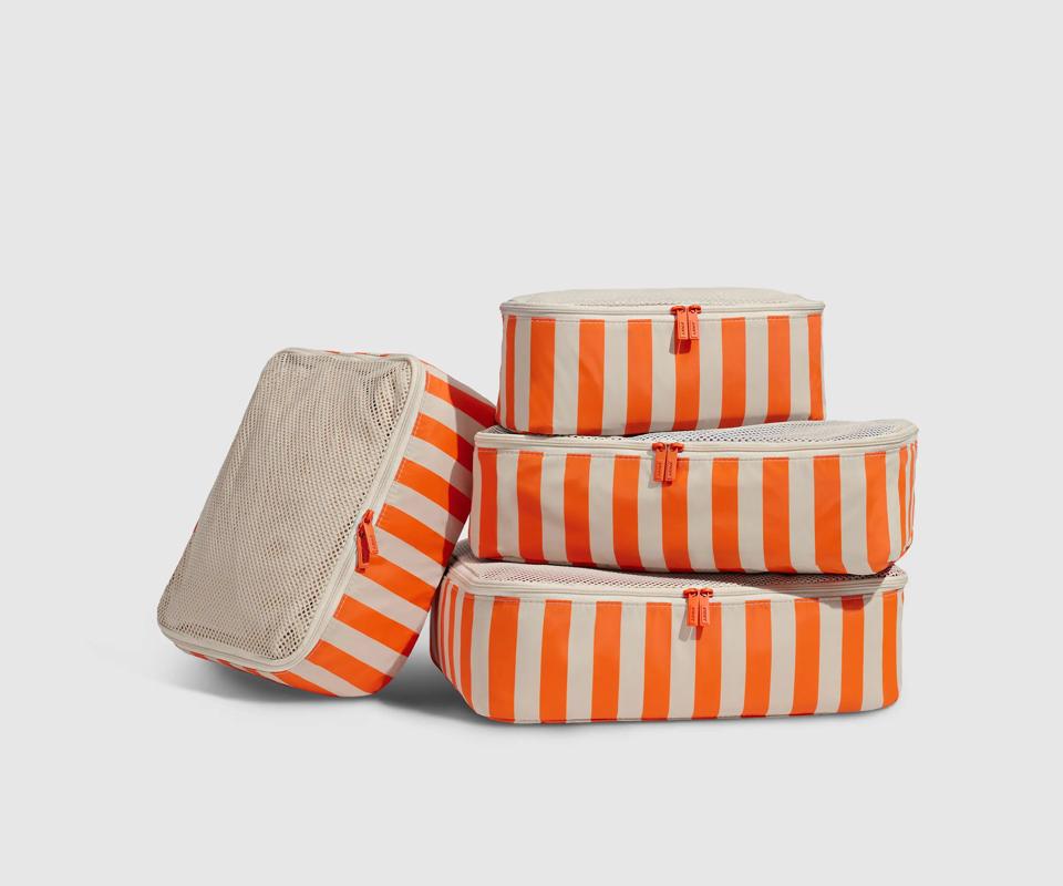 Orange and white striped packing cubes.