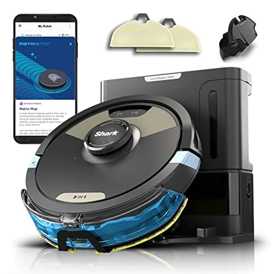 Shark Matrix Plus 2-in-1 Robot Vacuum & Mop in black leaning against its charging base