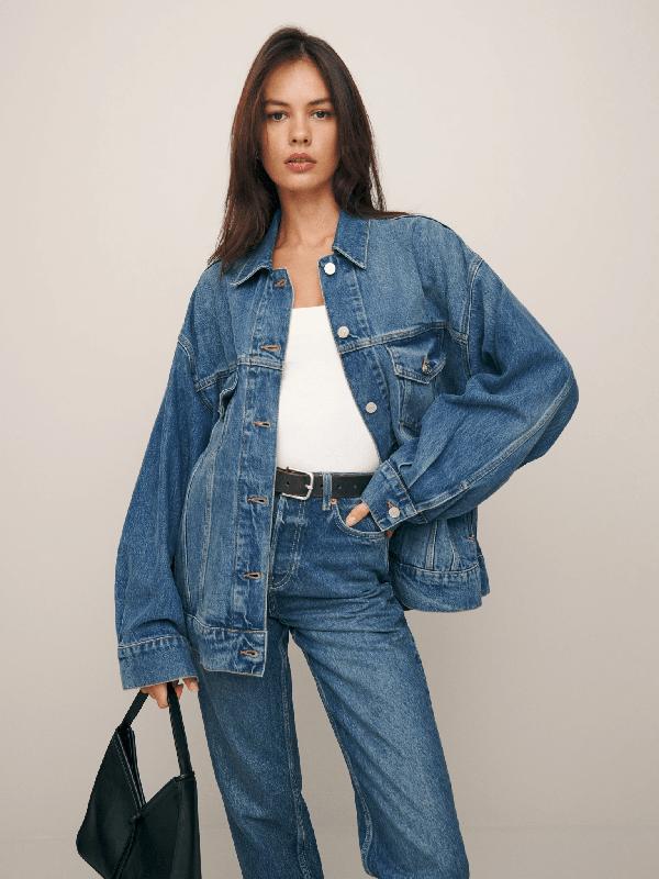 Reformation Brooks Oversized Denim Jacket on a model wearing jeans.