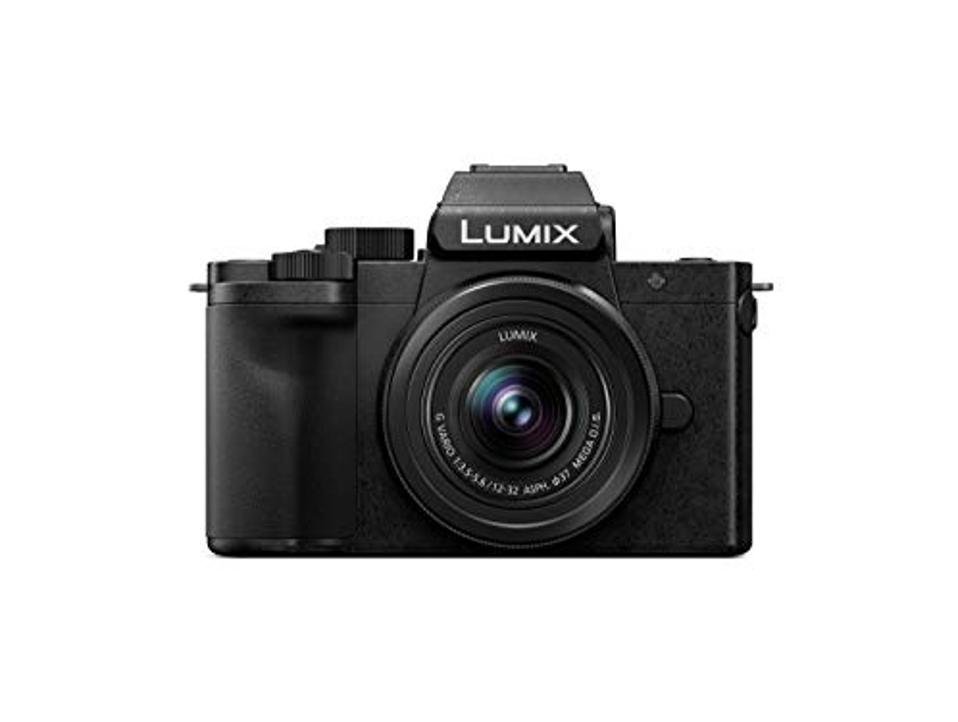 the Panasonic LUMIX G100 on a white background