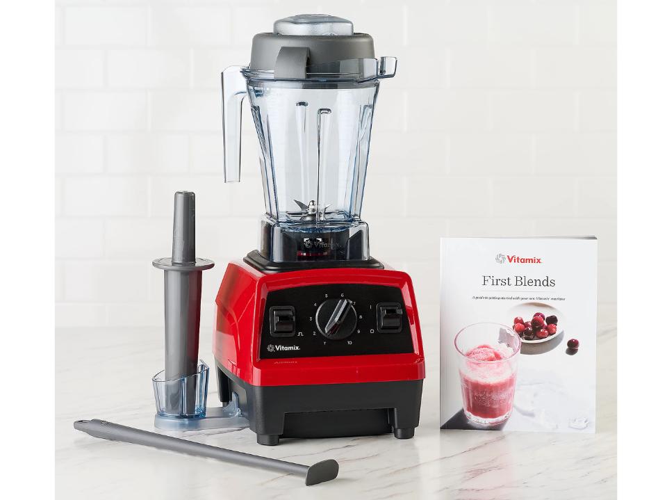 photo of Vitamix Explorian 2.0 Variable-Speed Blender And Recipe Book on marble top on white wall