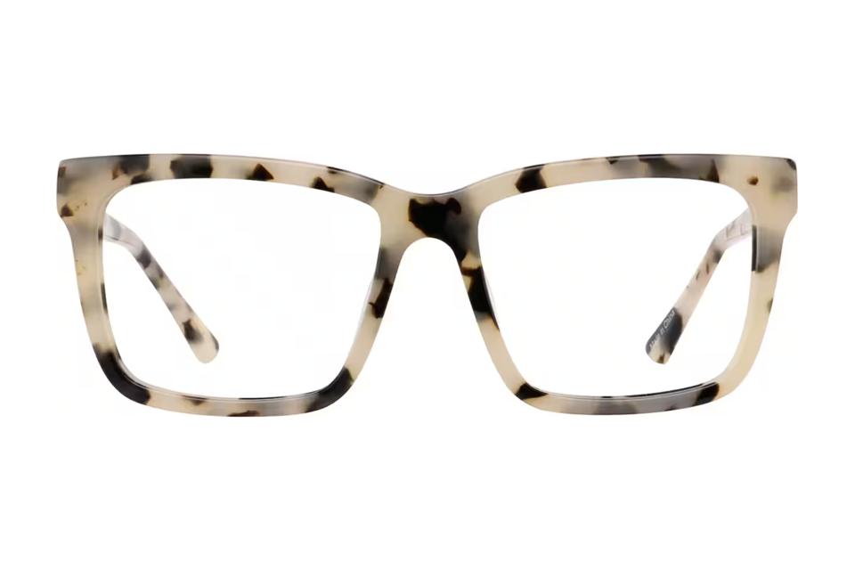 Thick-rimmed light tortoise shell square frames on a white background.