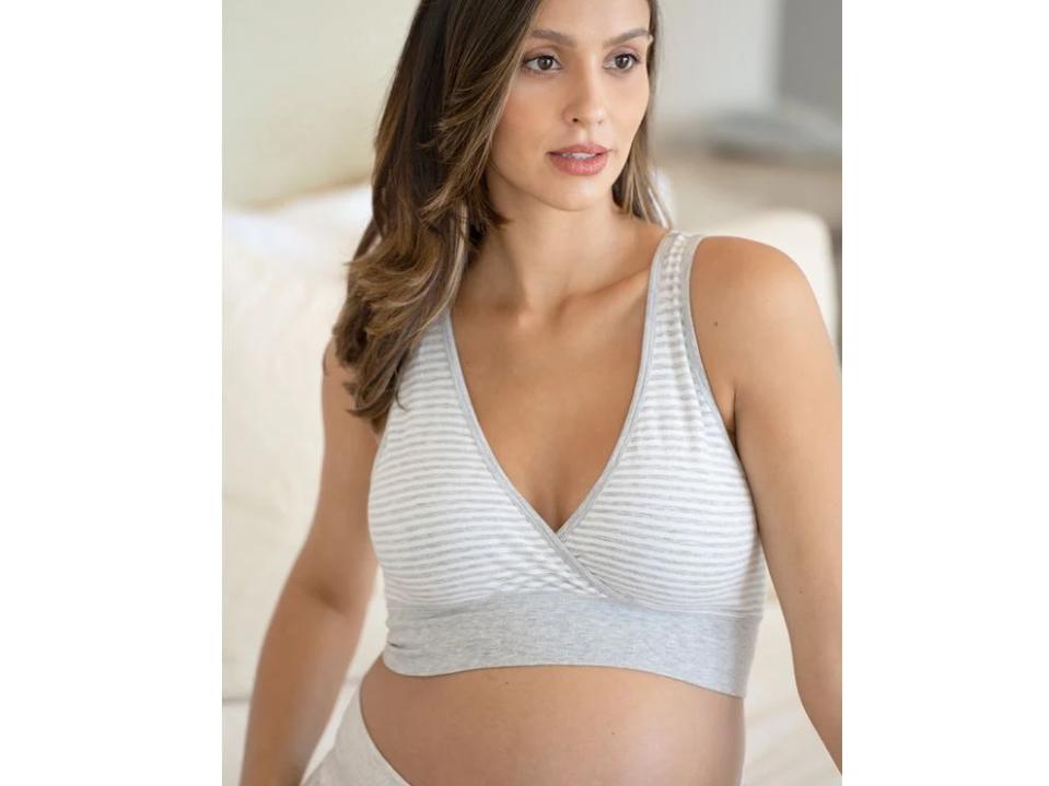 A woman wearing the Bamboo Maternity and Nursing Sleep bra from Seraphine in gray stripes