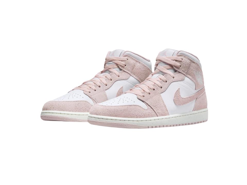 photo of pink pair of Air Jordan 1 Mid SE on white background