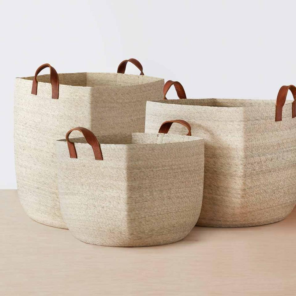 Woven storage baskets with leather handles