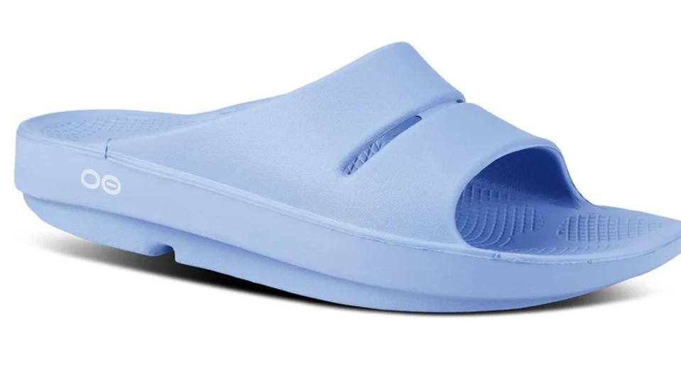 product shot of Oofos Ooahh Slide Sandal in the Neptune blue colorway.