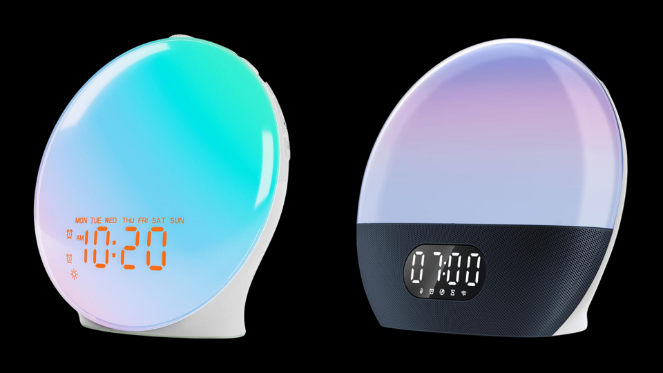 Two sunrise alarm clocks on a black background