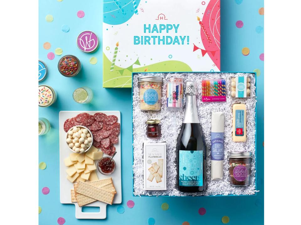 photo of Wicked Good Cupcakes Let’s Party Birthday Wine Gift Box w/ confetti on lightblue bg