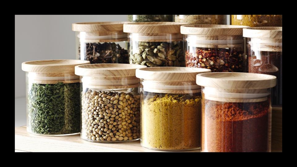 Williams Sonoma's Hold Everything Stackable Spice Jars filled with various spices.