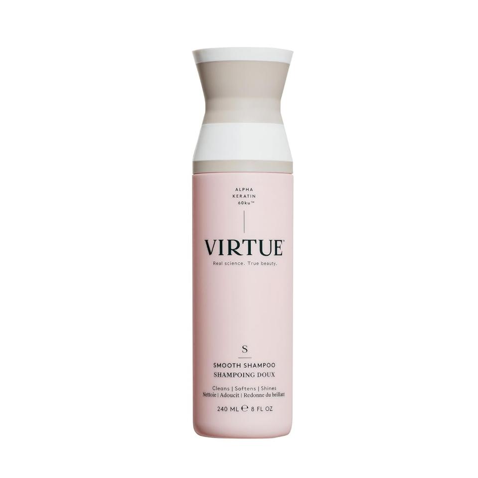 Virtue Living Proof shampoo on white background.