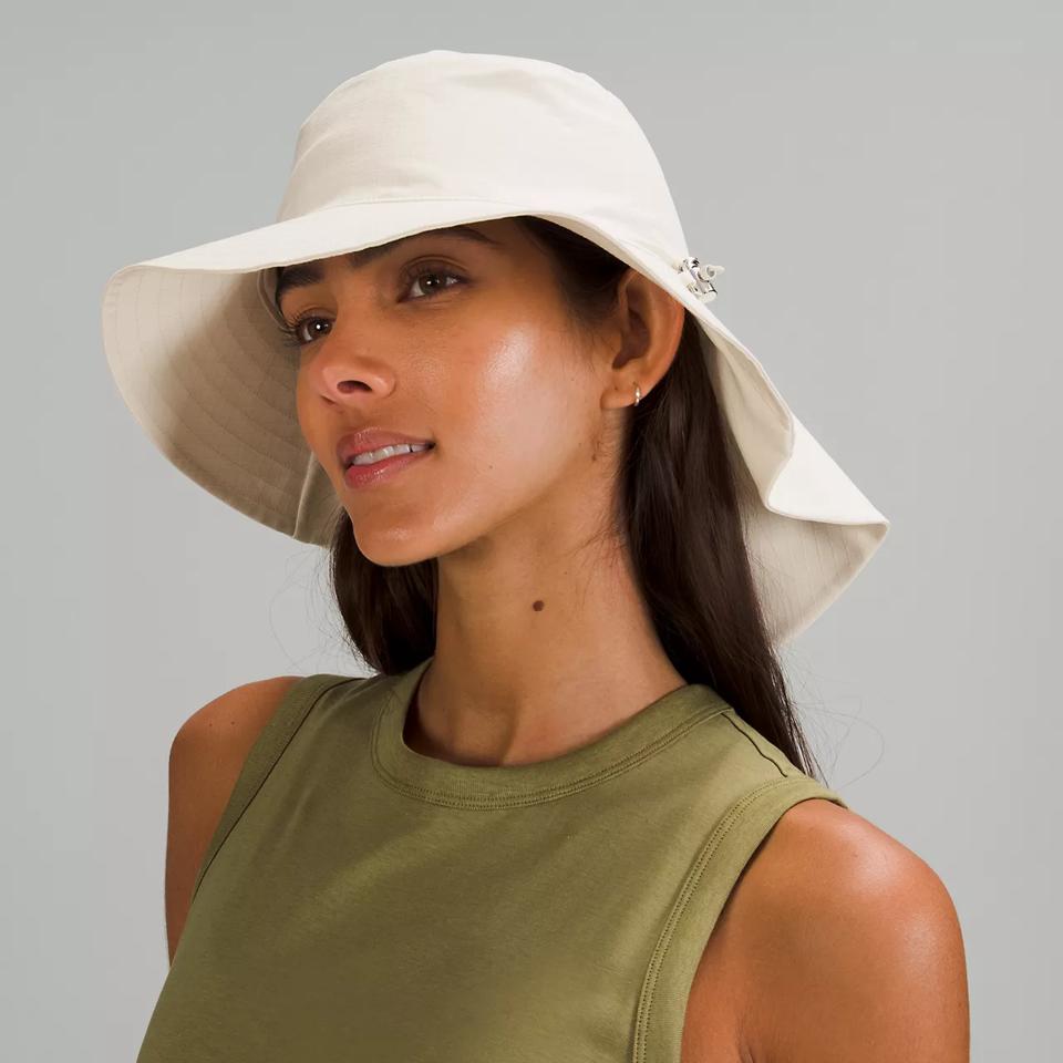 Lululemon Cinchable Wide Brim Bucket Hat on a white background.