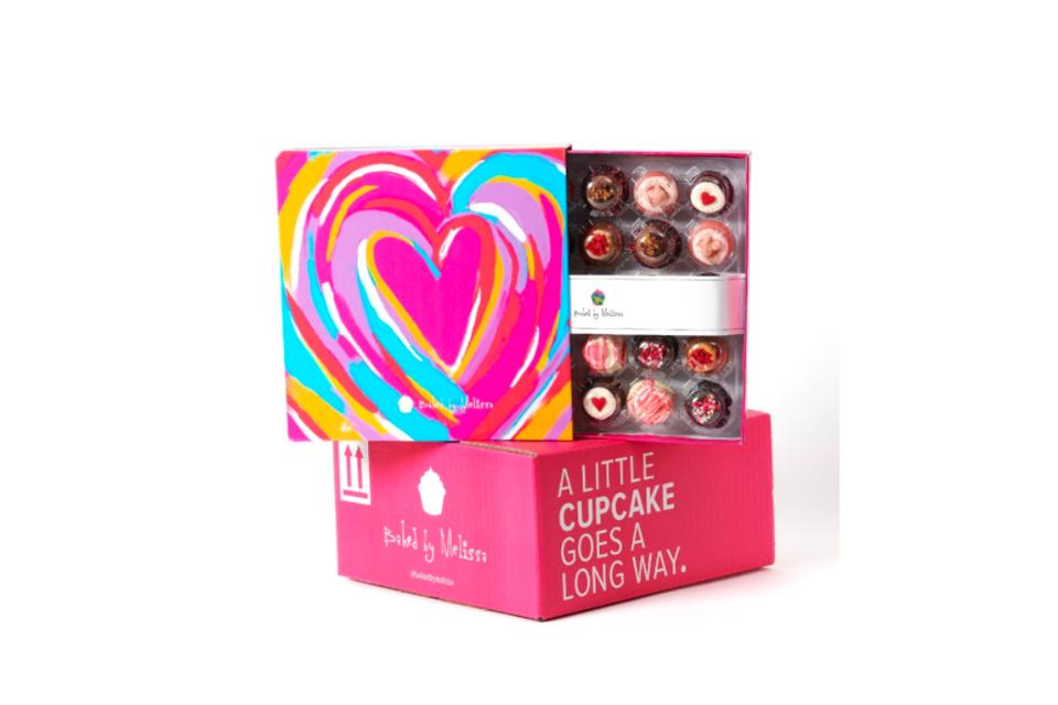 pink Baked by melissa Love Gift Box half open 25 mini cupcakes variety inside white background