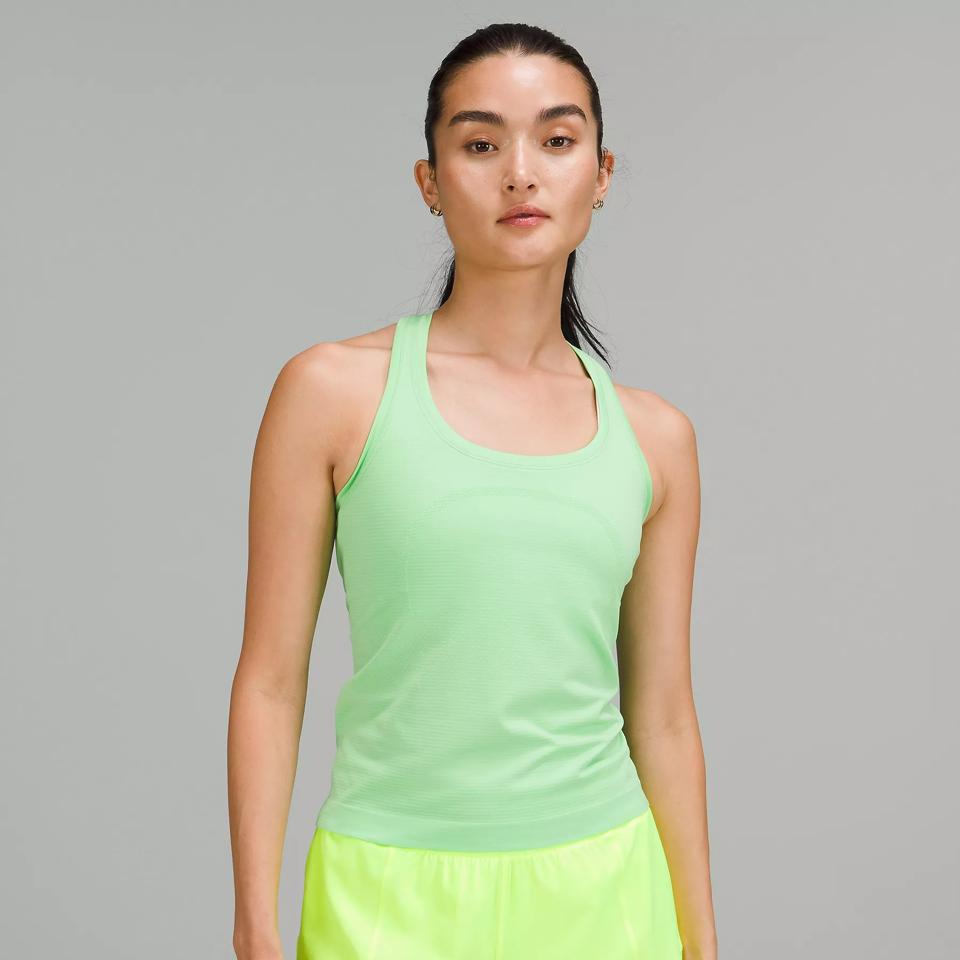 Woman wearing lululemon swiftly tech racerback tank